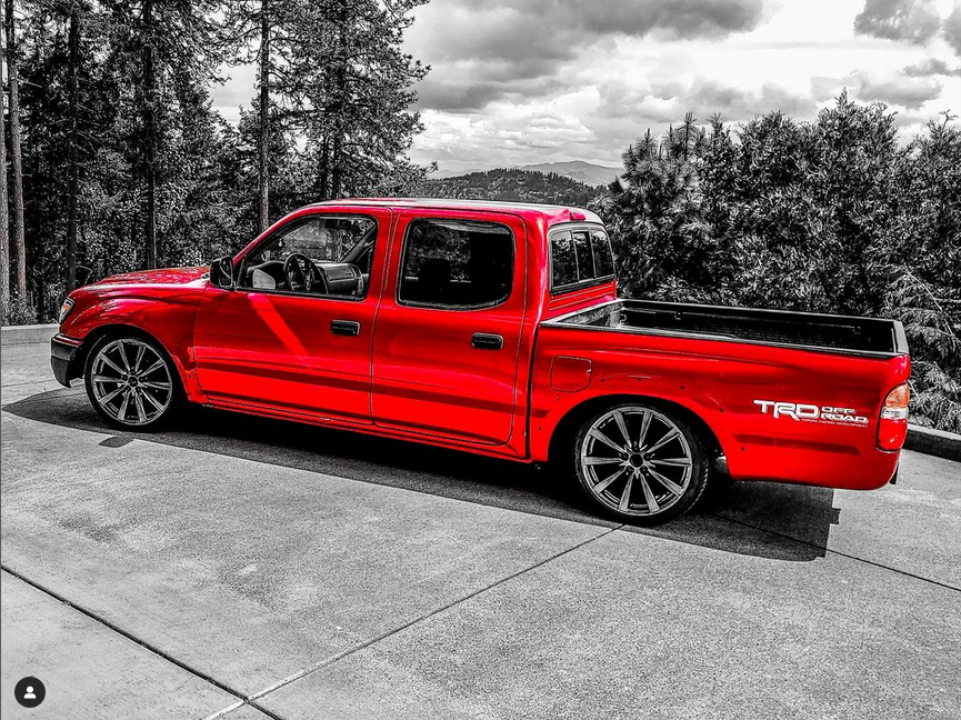 lowered red toyota tacoma