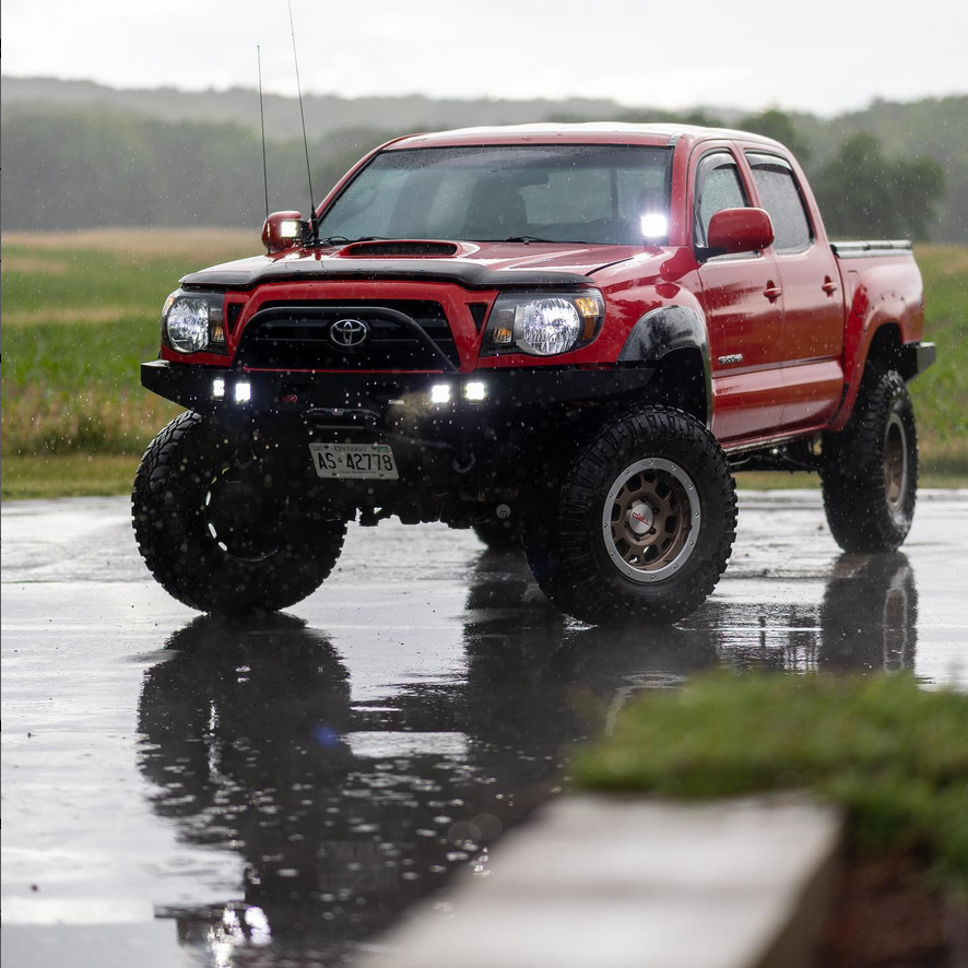 red tacoma with trd beadlock wheels