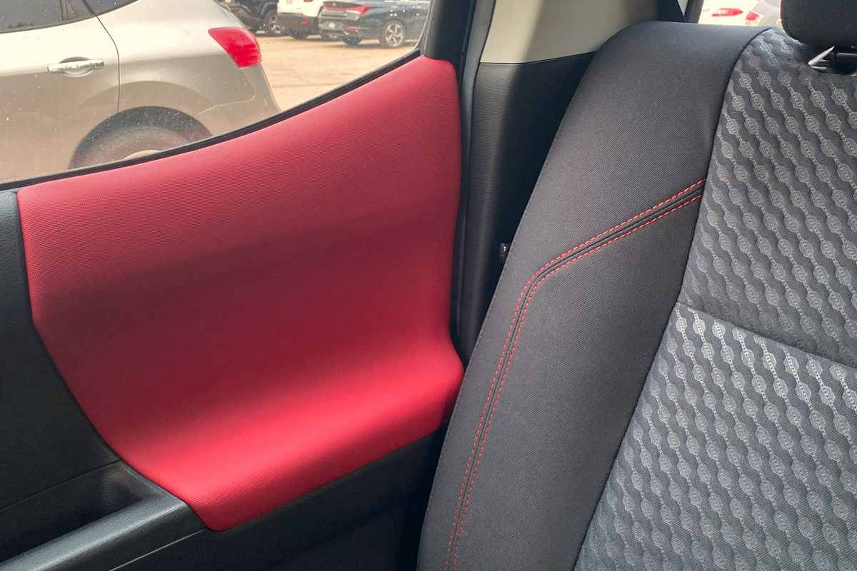 red stitching and passenger door