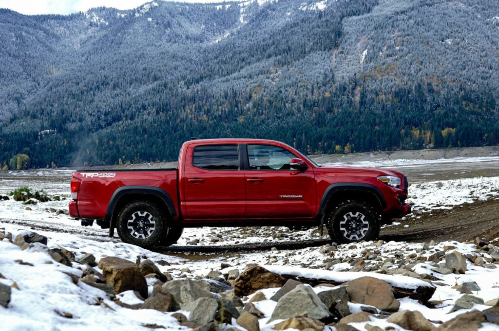 toyota tacoma on trail in rocky terrain