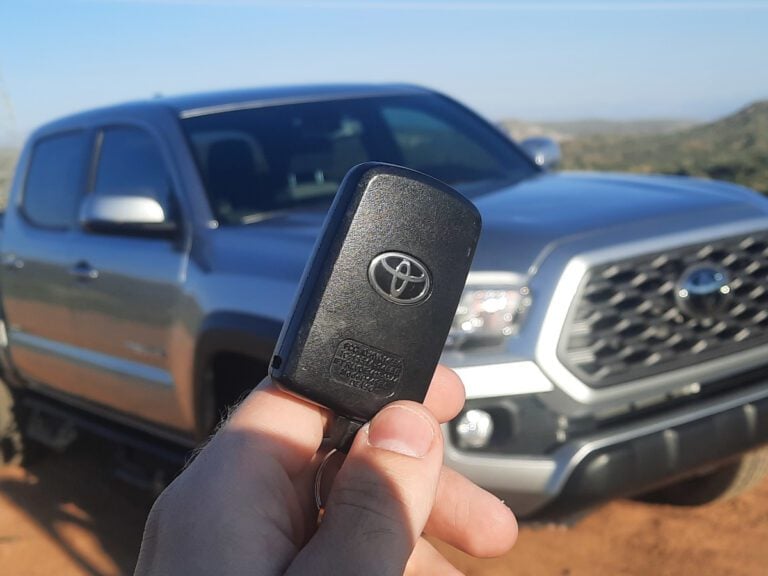 key fob with toyota tacoma in the background