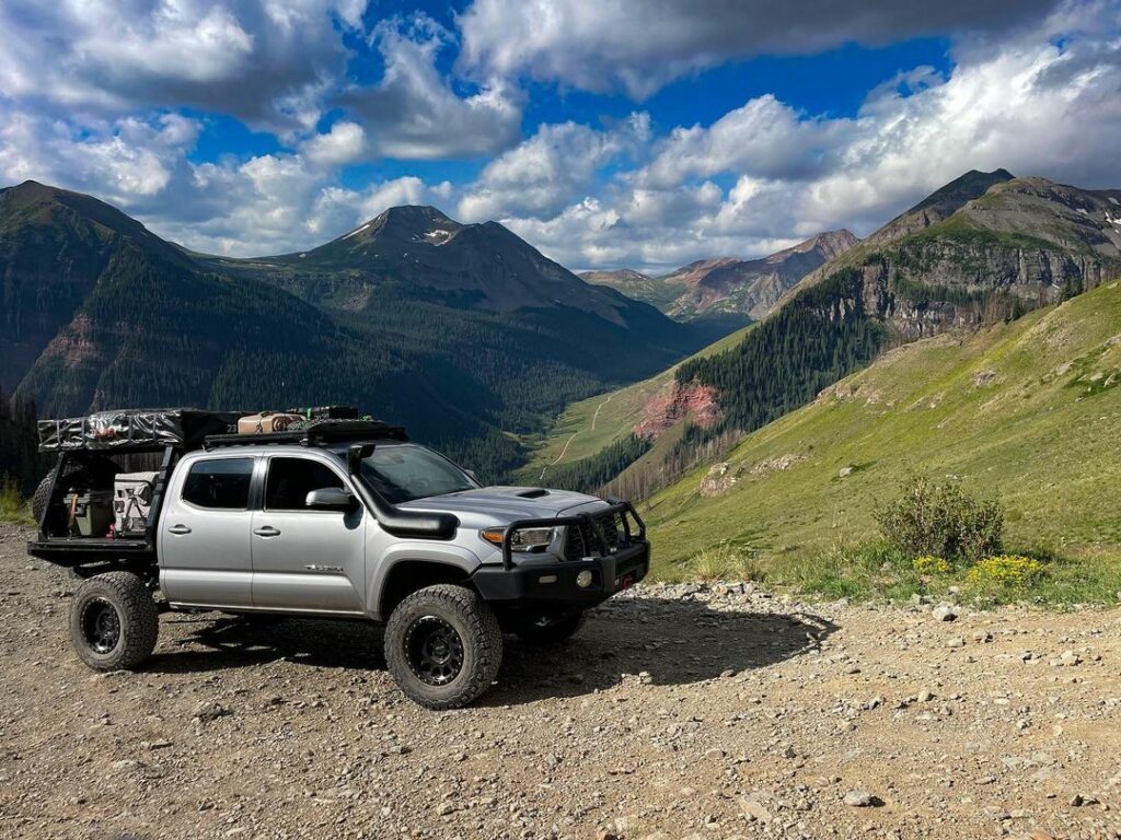 flatbed tacoma overlanding in mountains